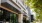 an entrance to a building with trees