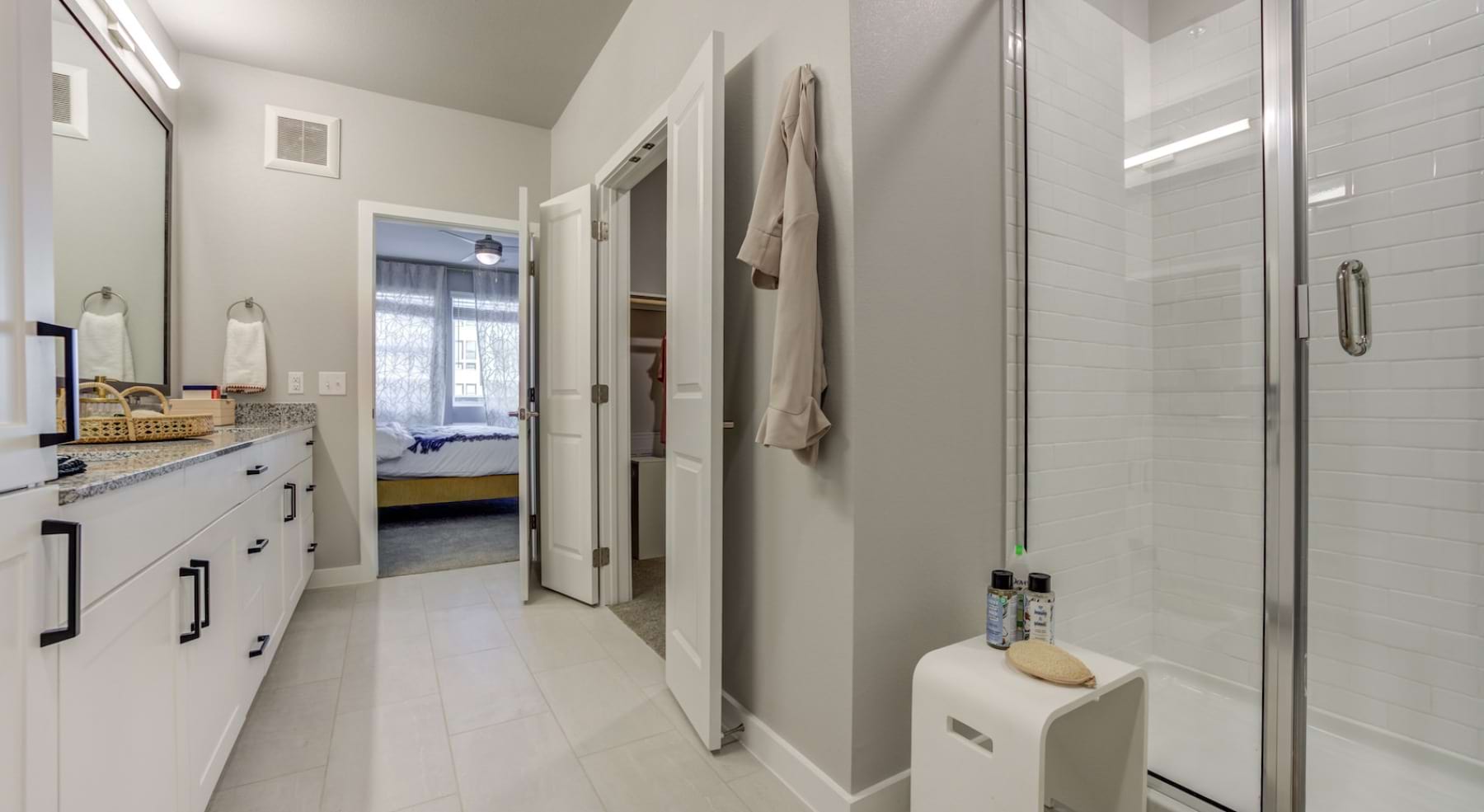 bathroom with dual vanity and walk-in shower at Alder