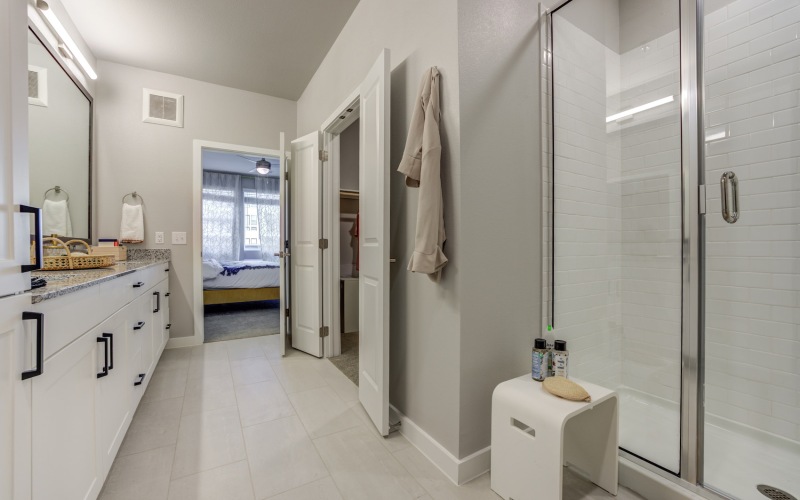 bathroom with dual vanity and walk-in shower at Alder