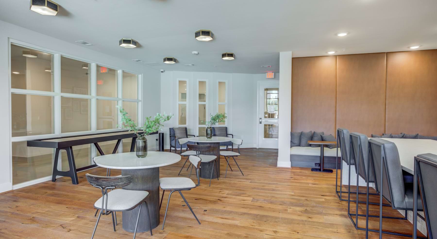 alder resident lounge  featuring kitchen and shuffleboard