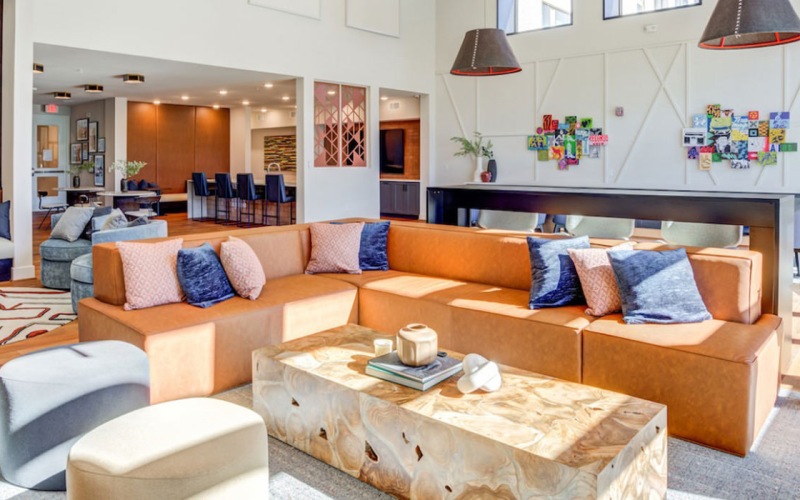 clubroom with ample seating and large windows