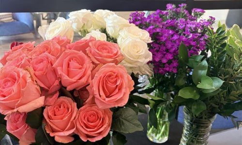 bouquets of flowers in a bright room