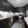A kitchen with stainless steel appliances at The Grove Apartments in Austin.
