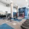 Large fitness center with large windows and plenty of equipment