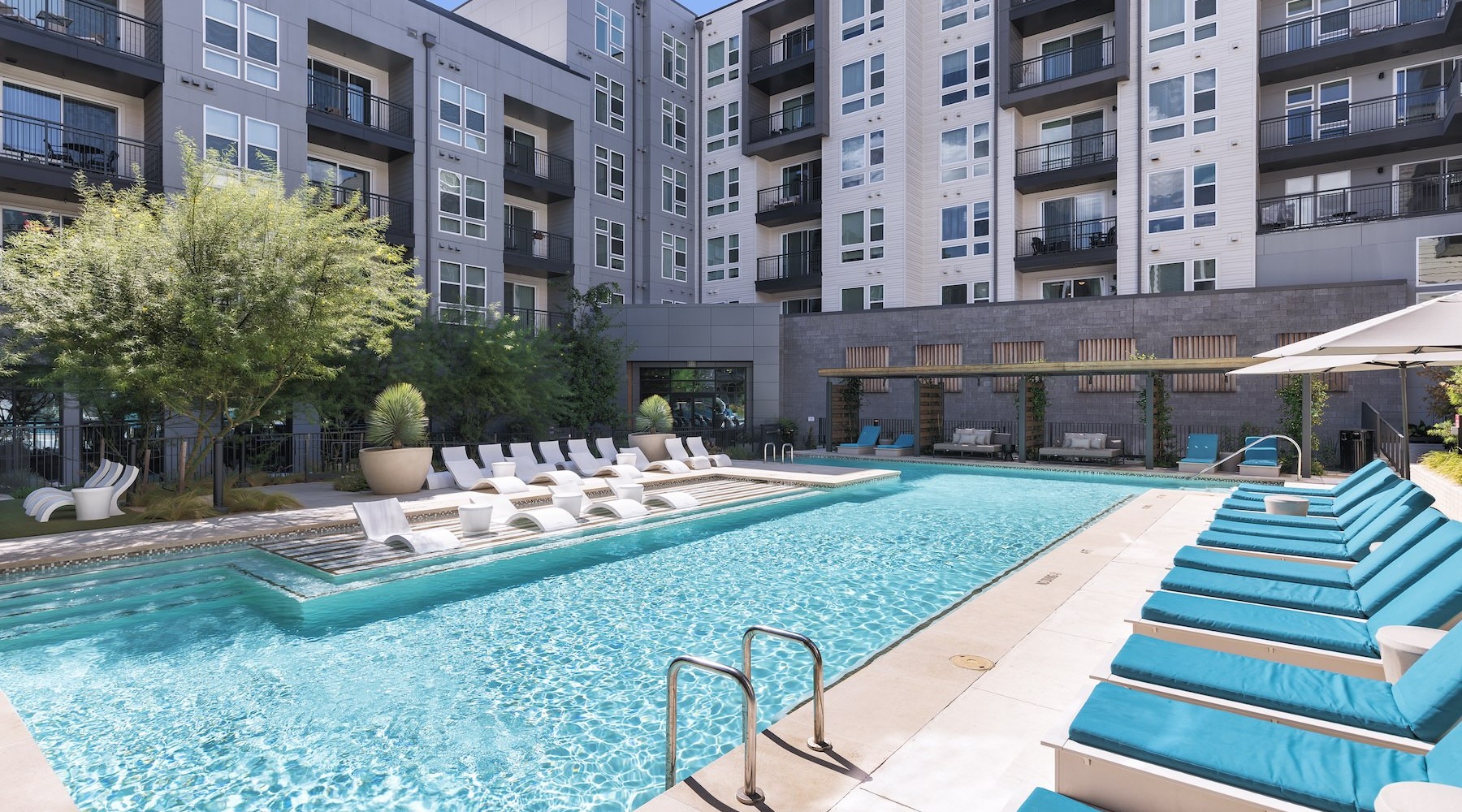 pool with lounge chairs
