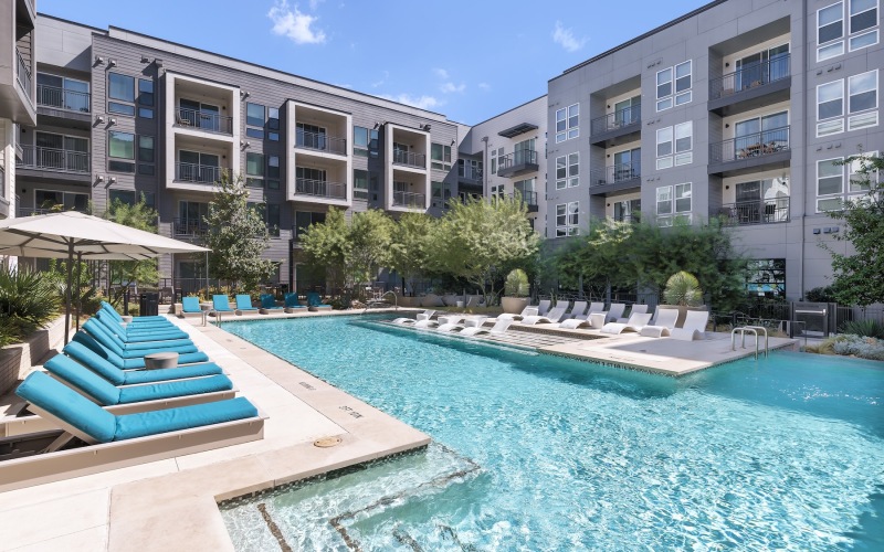 pool with lounge chairs
